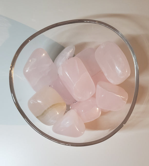 Soft Pink Mangano Calcite Tumbled pieces in various sizes