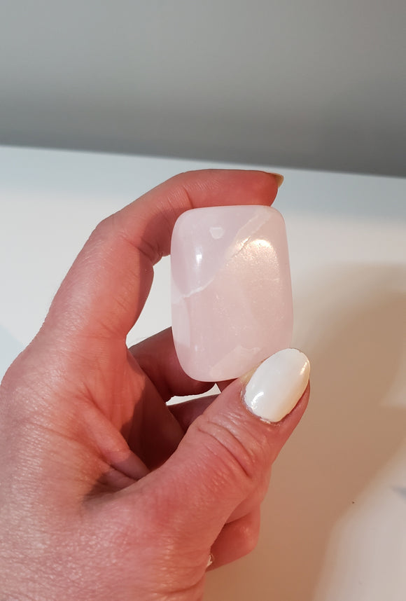 One Soft Pink Managano Calcite tumbled stone